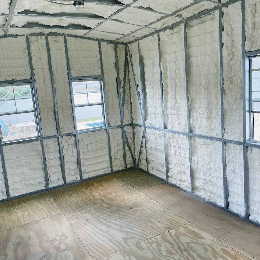 Closed-cell spray foam insulation applied to wall cavities in a residential project in Floral City